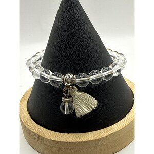 Clear Quartz Crystal Beaded Bracelet with A Decorative Silver Charm and Tassel